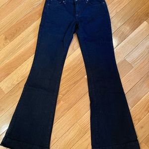 Flared Lucky Brand by Gene Montesano dark black jeans are made in America.